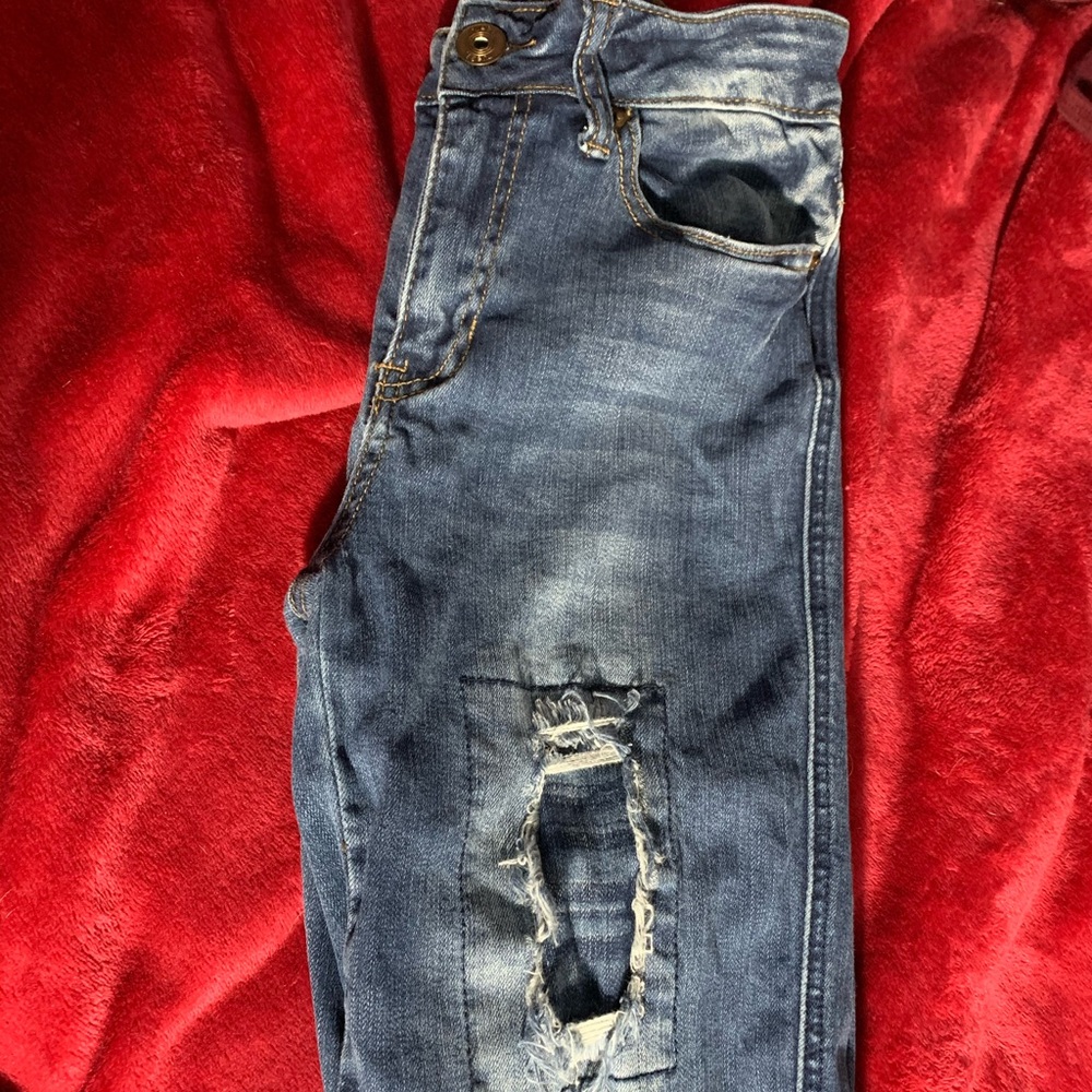 Ripped Blue Jeans